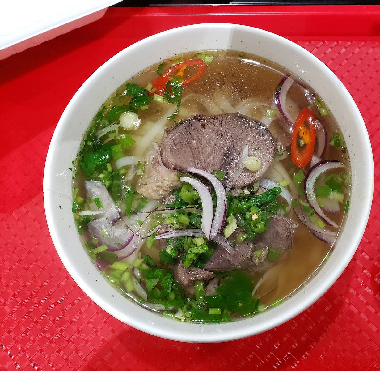 Ảnh mượn theo giấy phép mở — một tô phở có nạm, không phải tô phở của quán này